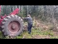 Timberjack 230 log skidder working in the forest