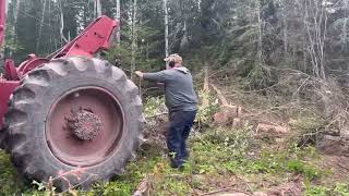 Timberjack 230 log skidder working in the forest