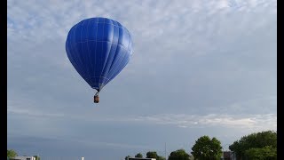 Balloon pilot navigates the breeze above Quebec.