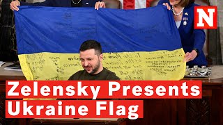 Zelensky Gives Ukraine Flag From Bakhmut Defenders To U.S. Congress