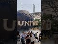 people posing for photo infront of universal studios logo. shortsfeed shorts universalstudios