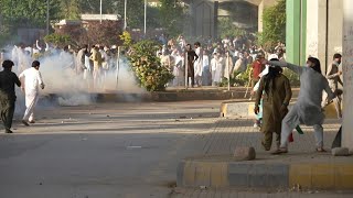 Police clash with protesters in Peshawar following Imran Khan's arrest | AFP