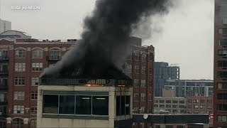 1 dead, 4 injured in River North parking garage fire