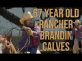 67 yr old rancher DRAGGIN CALVES