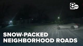 Snow-packed roads in Tulsa neighborhoods