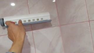 Настенное устройство для сушки белья в ванной