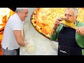 Masters show us how to make pizza dough in Roman pizzeria in Rome, Italy