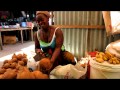 Chopping coconut open in Vilankulo market