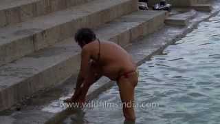 Sadhus taking a holy dip