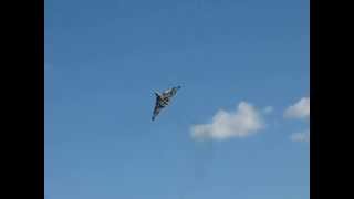 Avro Vulcan XH558 circles over XM607 at Waddington