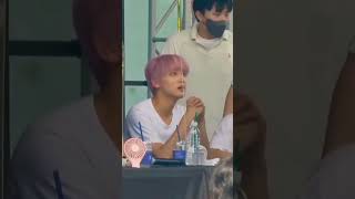 Haechan offering his water to a fan (the way he looks at her omg)