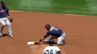 Dozier makes a sliding play to turn two