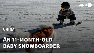 Eleven-month-old baby becomes Chinese snowboard sensation | AFP