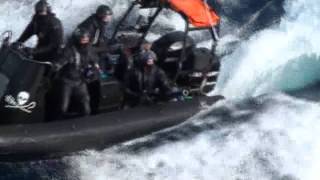 Sea Shepherd activists fire a projectile launcher toward the Yushin Maru No. 2