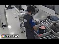 TSA agents caught on camera apparently stealing from passengers luggage