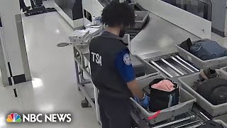 TSA agents caught on camera apparently stealing from passengers luggage