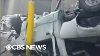 Chemical tank implosion aftermath video shows crushed trucks and deadly scene