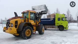 Volvo L90H 2,0 Loading snow on Volvo trucks