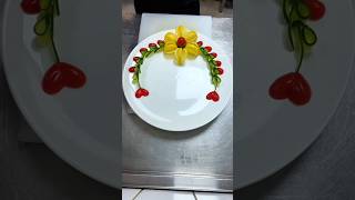 Elegant Plating: Flower Decoration with Lemon, Cucumber, and Cherry Tomatoes