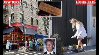 Fans of Matthew Perry leave flowers outside iconic Friends 'apartment' in NYC