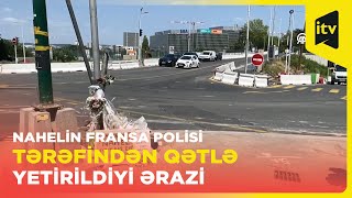 17 yaşlı Nahelin Fransa polisi tərəfindən qətlə yetirildiyi yerə insanlar gül qoyaraq yad edirlər