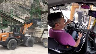 CASE 821G wheel loader loading Perlini DP255 in a Dolomites quarry