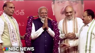 Prime Minister Modi claims victory in close India election