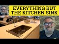 🔵 Everything But the Kitchen Sink Meaning - Everything But the Kitchen Sink Examples - Idioms