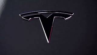 Tesla warns of slower volume growth in 2024 | REUTERS