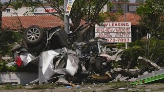 Two killed after car crashes into fire hydrant