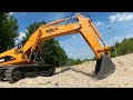 rc bagger testfahrt mit dem huina fm1550 von fm electrics.de