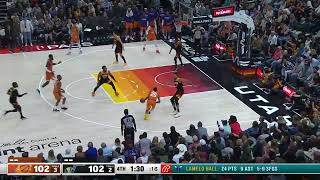 Mikal Bridges freezes up Rudy Gobert on the closeout and commits a drive by left handed slam