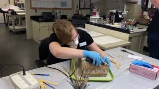 Workers begin cutting open 1887 time capsule