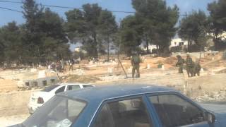 Israeli army training inside a Muslim cemetery in Hebron