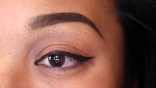 How to do a winged eye using a #266, #209 brush and an eye pencil.