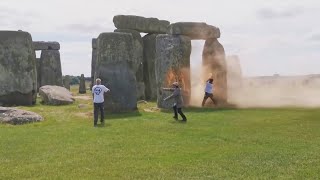 Camera footage captures climate activists spraying orange paint on Stonehenge