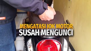 Mengatasi jok motor susah dikunci