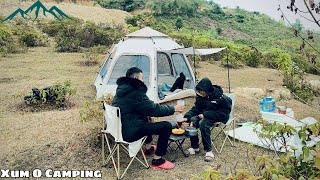 Relaxing camping on the hill with my brother, cooking a warm pot of hotpot on a cold winter day.