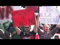 migrant caravan angry protests in mexico s tijuana bbc news