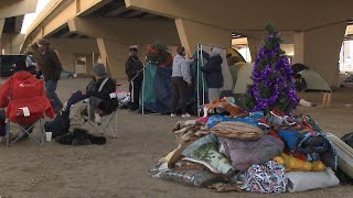 Motorcycle Club Spreads Holiday Joy to Milwaukee's Homeless Tent City