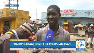 Ettemu E Busiika, Abaserikale ba poliisi babiri babakubye amasasi nebafiirawo