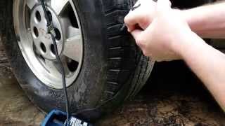 Plugging a car tire.