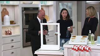 Blueland CEO Sarah Paiji Yoo demonstrates the Blueland Glass + Mirror Cleaner