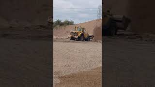 loading shovel moving gravel in a quarry volvo