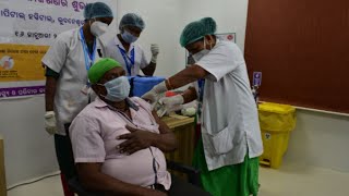 Covid-19: Health workers, officials get vaccine in Bhubaneswar, Indore