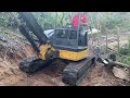 marine contractor vlog dangerous hill side excavator setting pilings for a utv ramp