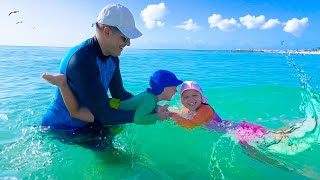 A lot of fun on the beach with parents