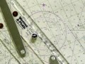 how to use a parallel ruler and compass rose to determine direction