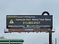 New billboard along 8 Mile Road alleges racial profiling in the area