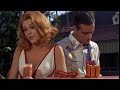 Stella Stevens spills her drink on Dean Martin in The Silencers 1966